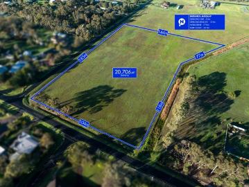 5 acres, dual frontages, unlimited potential
