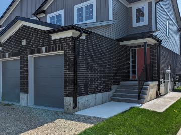 1 Bedroom, 1 Bathroom lower Unit with Garage