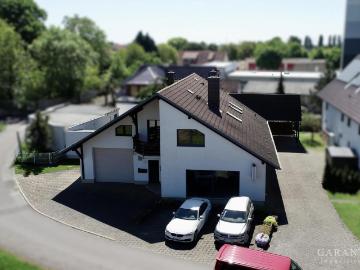 Vielfältig nutzbare Gewerbeeinheit inkl. zwei Wohnungen...