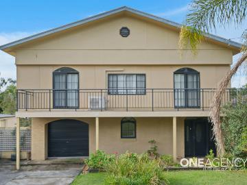 WELL APPOINTED HOME WITH ELEVATED OUTLOOKS