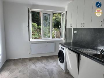 Wohnküche mit Gartenblick + Zimmer