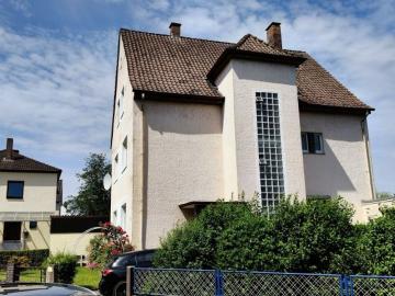 Zentrumnahes Mehrfamilienhaus mit Gartenidylle und...