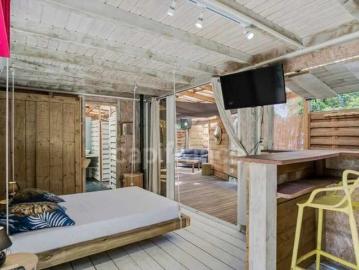 A louer Case Pilote Maisonnette en bois de type Studio