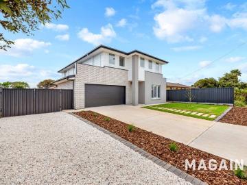 Big, brand new family home close to the beach