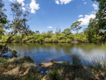 Coastal Hinterland Riverfront Acreage A Private Nature...