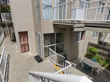 Courtyard Apartment in Complex of Four