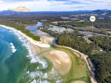 DUAL STREET ACCESS FOR YOUR COASTAL MASTERPIECE. !