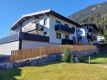 Erdgeschosswohnung 65 m2 mit Garten und Tiefgarage