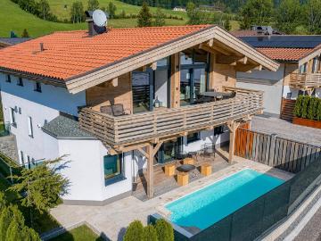 Exklusives Chalet mit Pool unmittelbar am Golfplatz