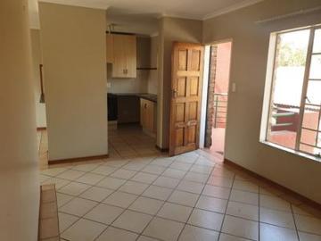 first floor unit with balcony on the.