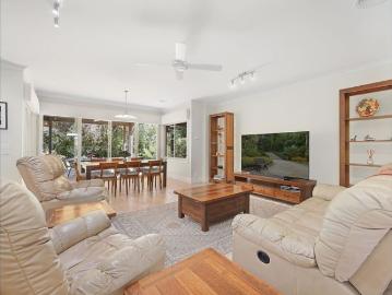 Grand Living in a Lush Garden Haven
