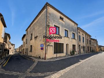 Immeuble en pierre avec garage, cour privative et fort...