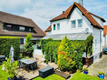 Kompaktes Einfamilienhaus mit Stil und Charme.