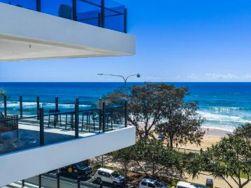 Live the Coastal Dream in a Boutique Absolute Beachfront...