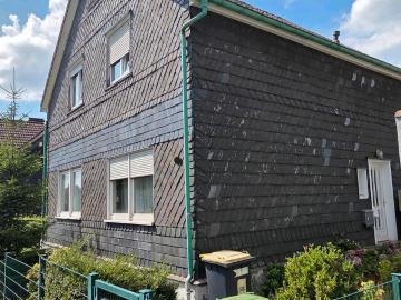 Mehrfamilienhaus mit großem Garten und 5 Garagen in...