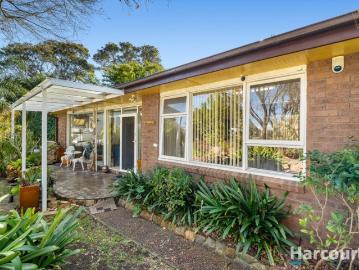 Mid century modern family size space across two...