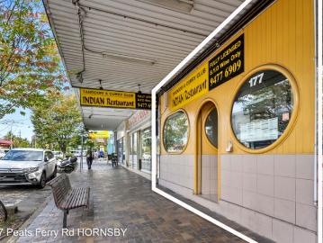 Rare offering Freestanding Building within 50m of train...