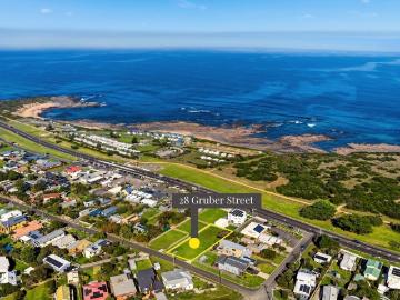 Rare Coastal Opportunity: Titled Land with Dual Aspect Views